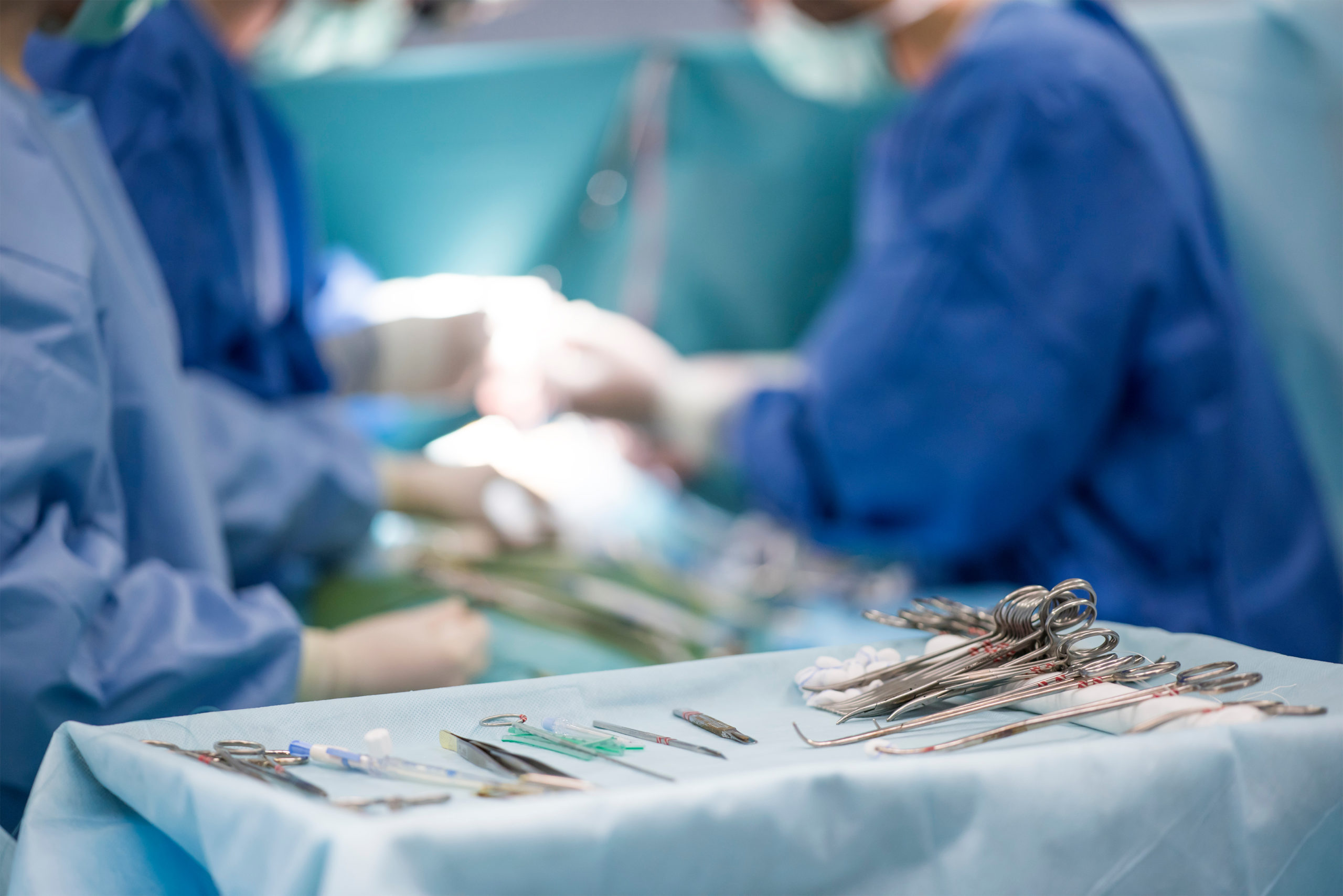 surgical instruments on the table during surgery sterile surgical instruments on during the operation table amid the surgeons